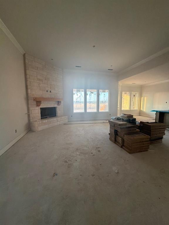 1002 Webb Court Van Alstyne, TX 75495 - Photo 6 of 11 a living room with furniture and a fireplace