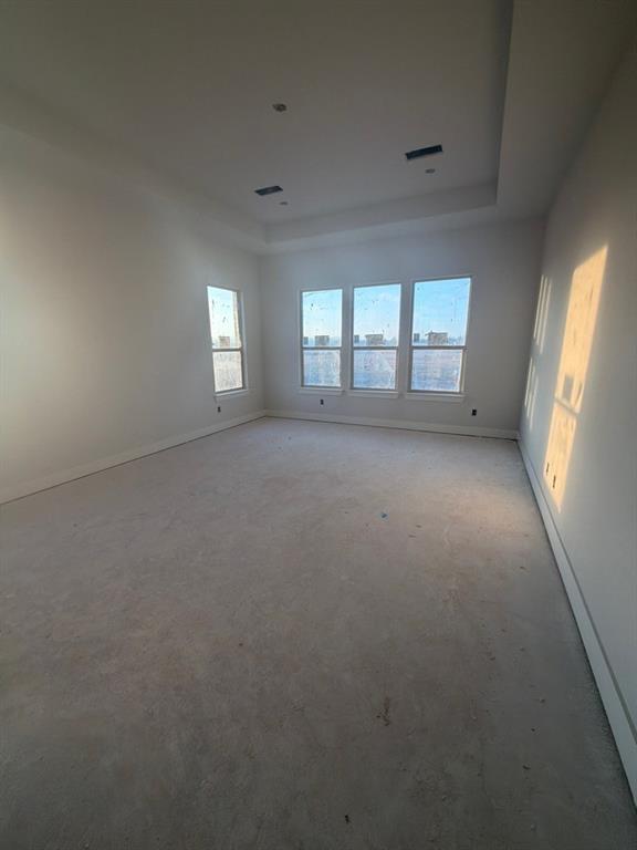 1002 Webb Court Van Alstyne, TX 75495 - Photo 9 of 11 an empty room with windows and closet