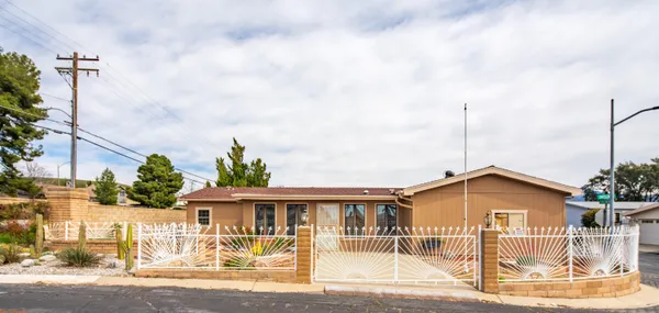 a front view of a house with a view of a house