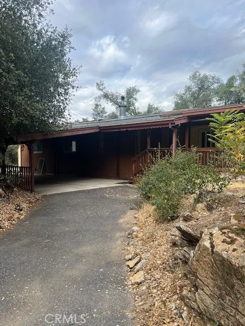 14600 Mono Sonora, CA 95370 - Photo 11 of 14 a front view of house with yard