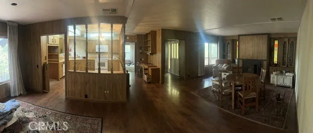 14600 Mono Sonora, CA 95370 - Photo 10 of 14 a hallway with dining room and chandelier