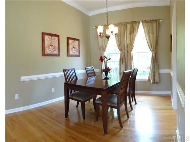 2321 Millstaff Court Raleigh, NC 27613 - Photo 3 of 17 This dining room is big and bright enough to hold any gathering!