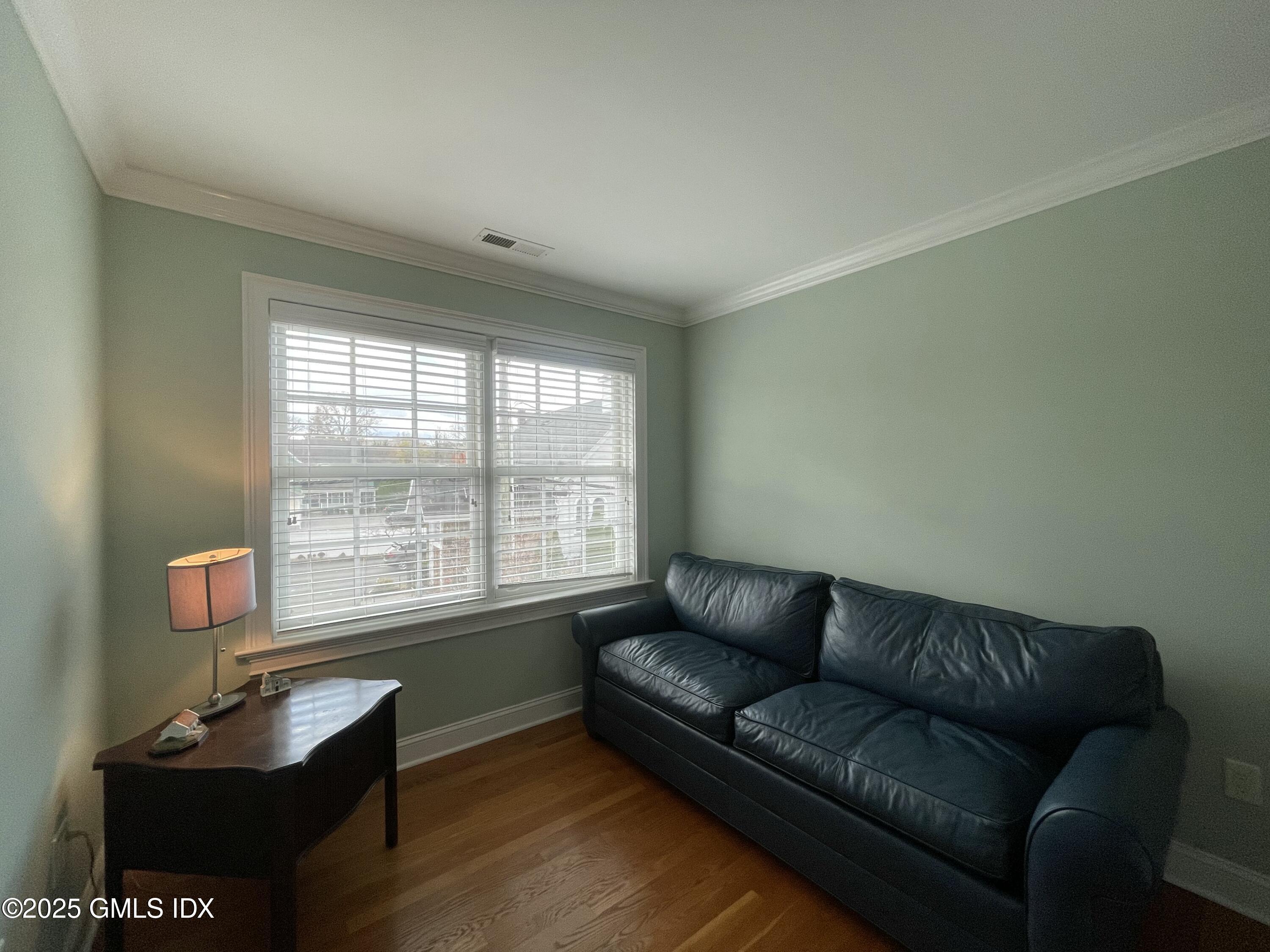 1 Northfield Street, Unit B Greenwich, CT 06830 - Photo 21 of 30 a living room with furniture and a window