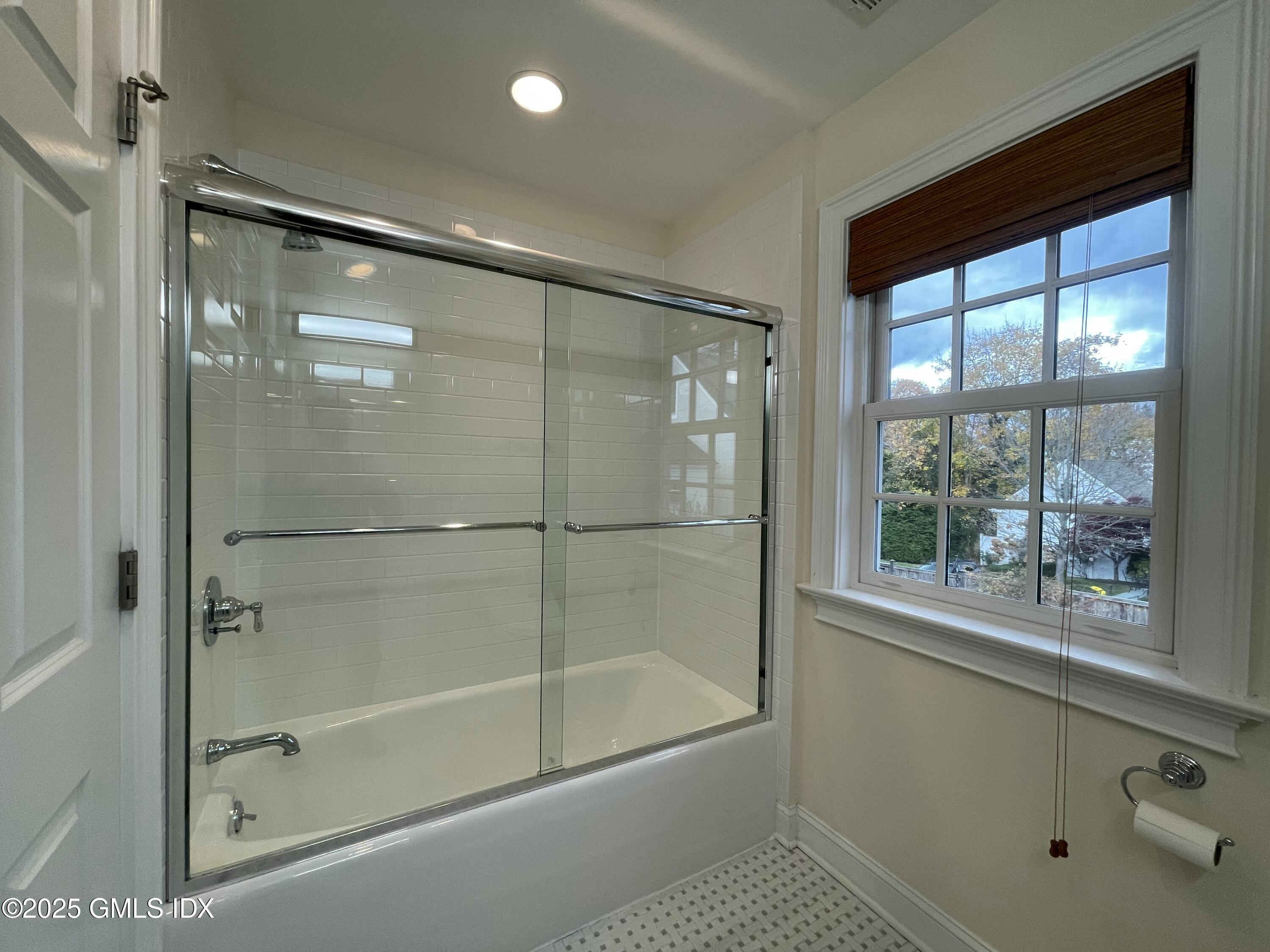 1 Northfield Street, Unit B Greenwich, CT 06830 - Photo 25 of 30 a bathroom with a glass shower door