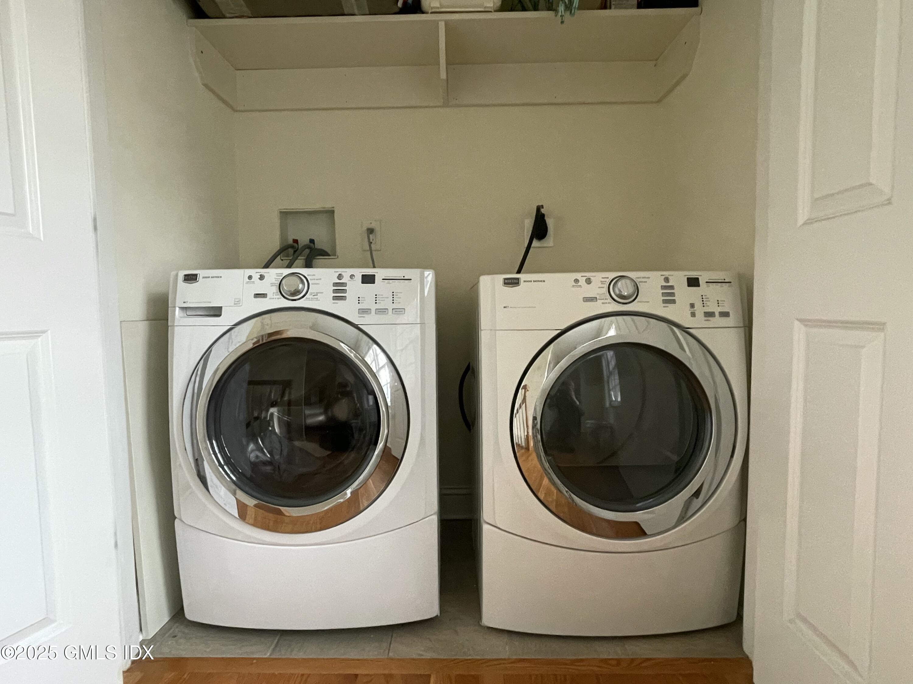 1 Northfield Street, Unit B Greenwich, CT 06830 - Photo 26 of 30 a utility room with dryer and washer