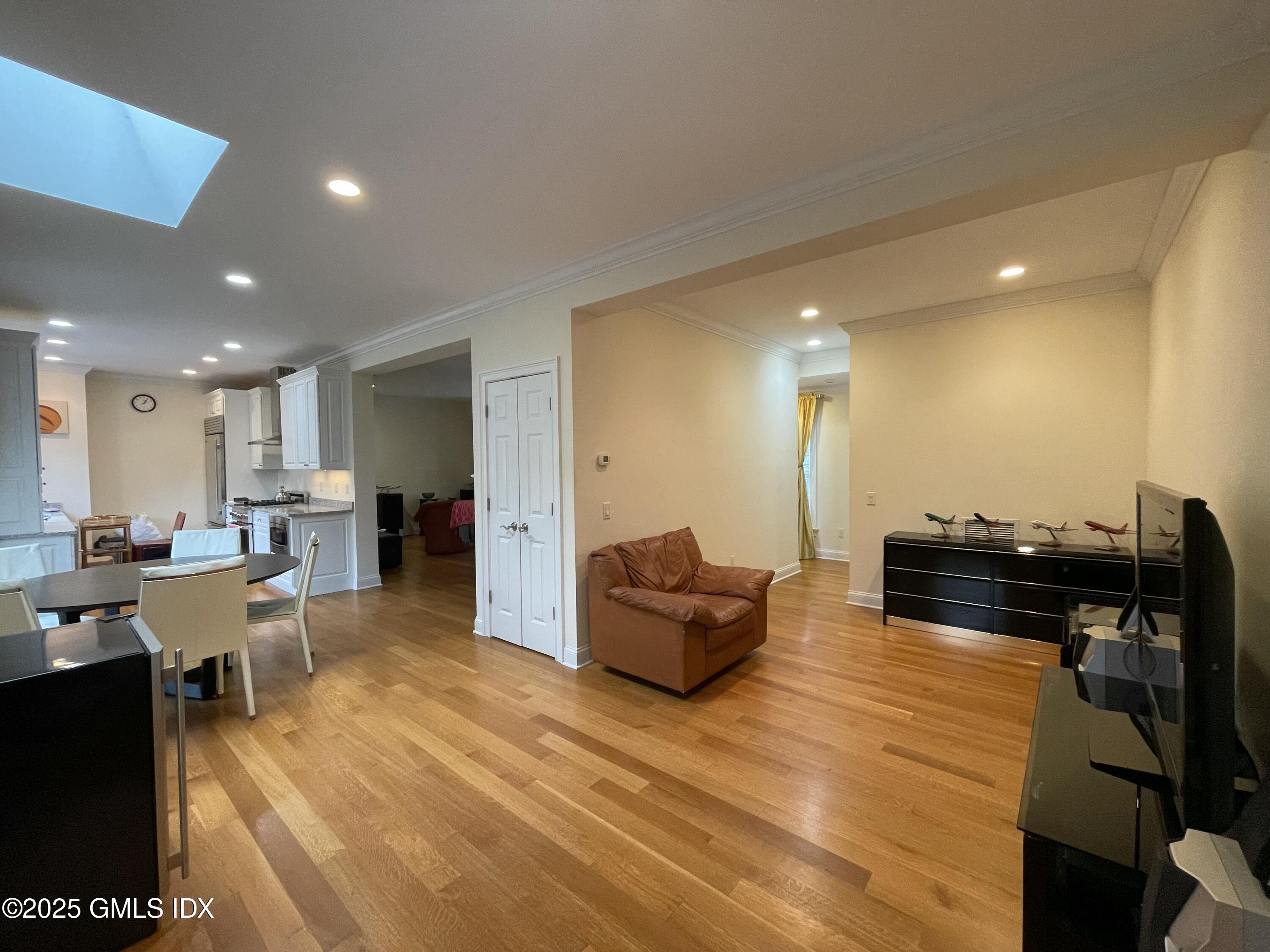 1 Northfield Street, Unit B Greenwich, CT 06830 - Photo 10 of 30 a living room with furniture and a flat screen tv