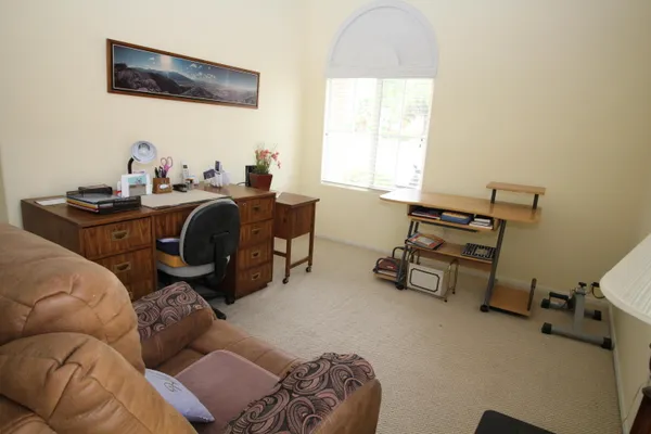 a room with furniture and a window