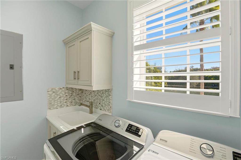 9263 Museo Circle, Unit 202 Naples, FL 34114 - Photo 39 of 50 a bathroom with a sink toilet and window