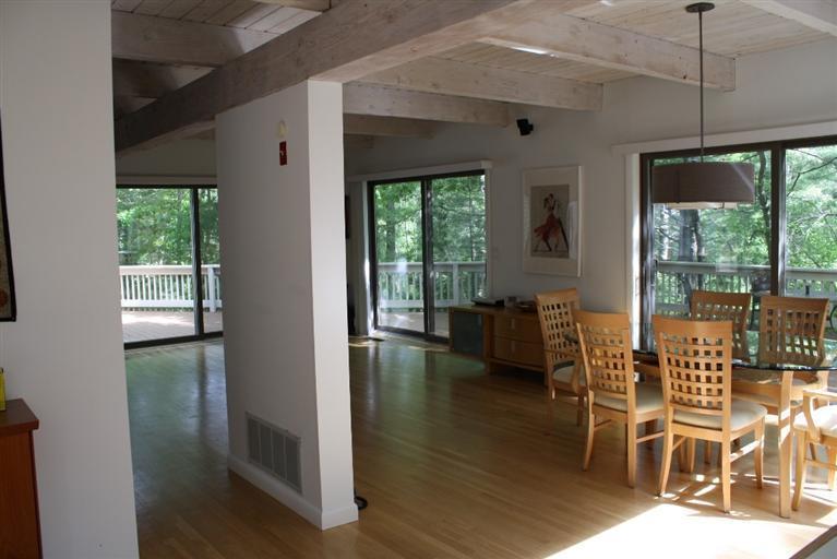 103 Paddock Circle Mashpee, MA 02649 - Photo 12 of 27 a view of a dining room with furniture window and outside view