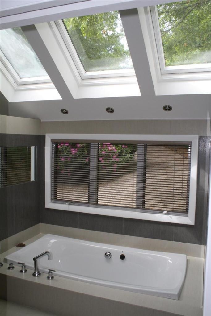 103 Paddock Circle Mashpee, MA 02649 - Photo 21 of 27 a bathroom with a bathtub and window