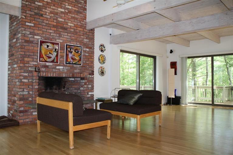 103 Paddock Circle Mashpee, MA 02649 - Photo 3 of 27 a living room with furniture and a fireplace