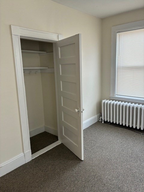 180 Lewis Street, Unit 2 Lynn, MA 01902 - Photo 11 of 14 a view of an empty room and a window