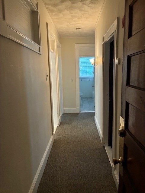 180 Lewis Street, Unit 2 Lynn, MA 01902 - Photo 2 of 14 a view of a hallway with a hallway