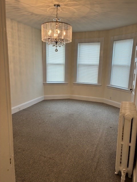 180 Lewis Street, Unit 2 Lynn, MA 01902 - Photo 3 of 14 a view of empty room with window