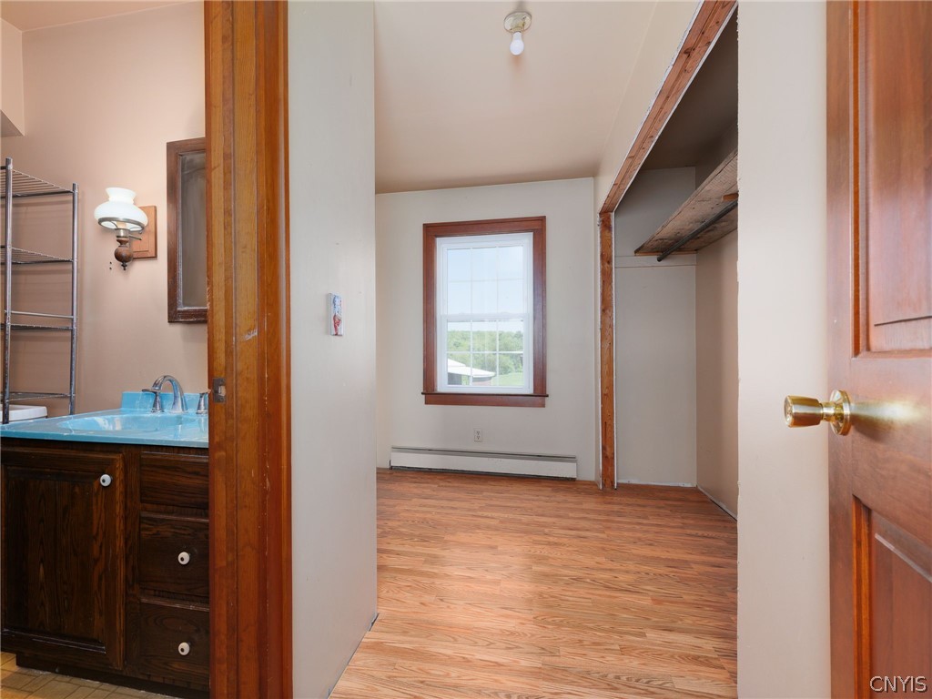12636 County Rte 66 Adams, NY 13606 - Photo 27 of 49 2nd floor primary bath and walk-in storage