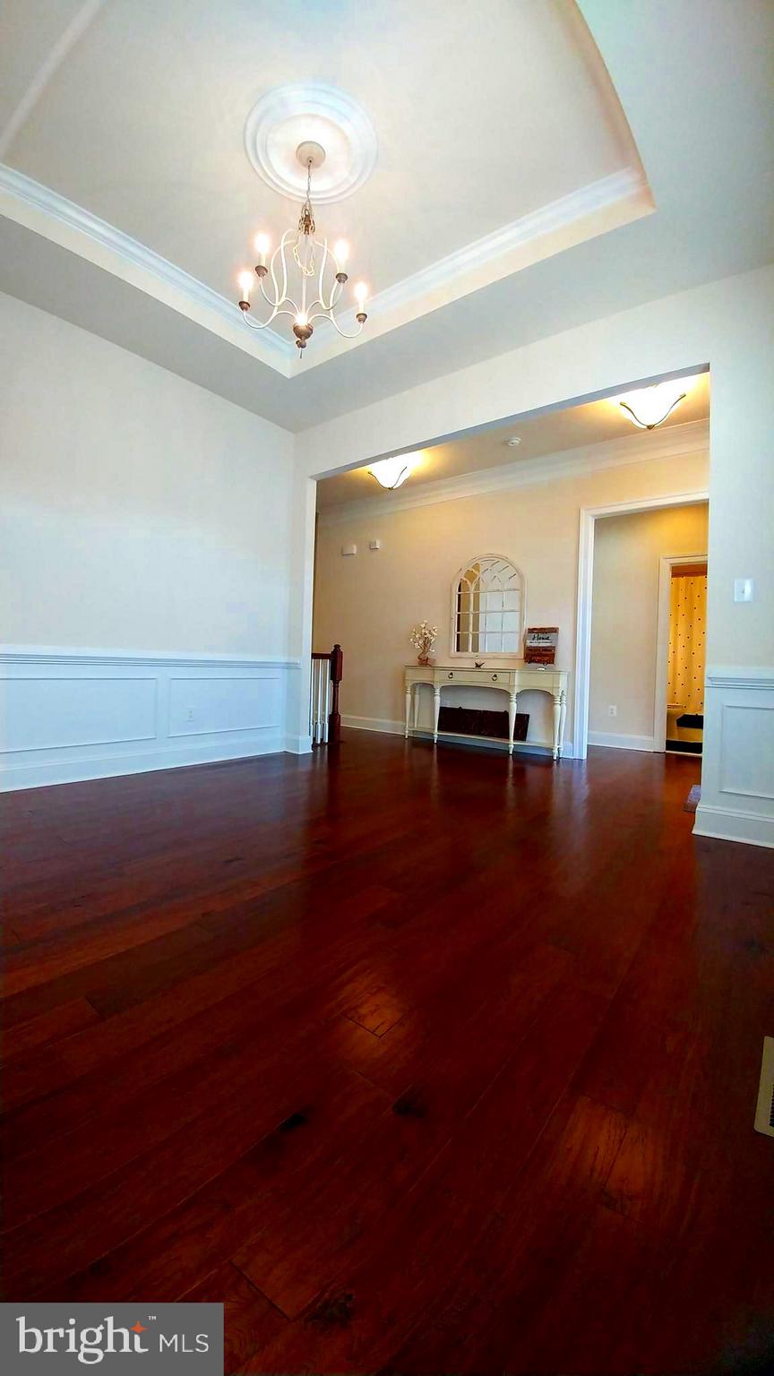 18714 Crimson Road Rehoboth Beach, DE 19971 - Photo 11 of 57 Upgraded tray Ceilings, Crown Molding, Wainscoting