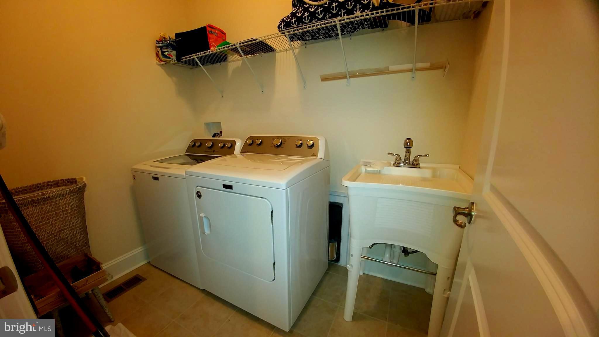 18714 Crimson Road Rehoboth Beach, DE 19971 - Photo 34 of 57 Laundry Room