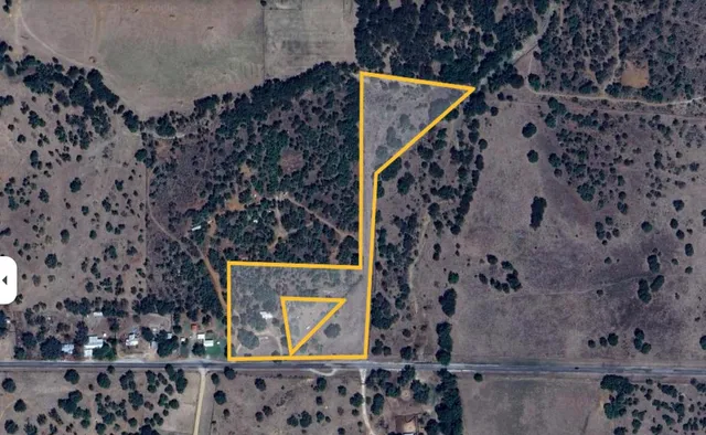 a view of a lake from a yard