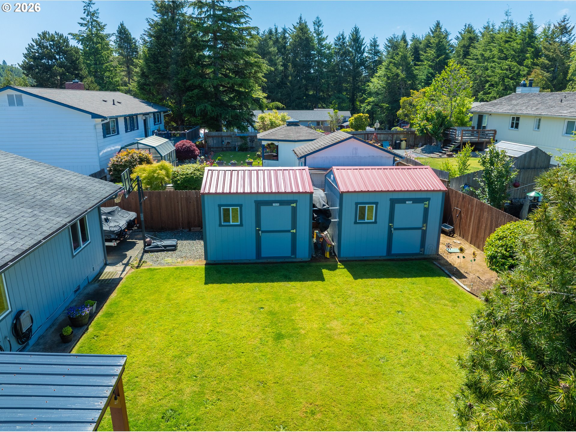 412 Camellia Court Reedsport, OR 97467 - Photo 44 of 48 a front view of a house with swimming pool having outdoor seating