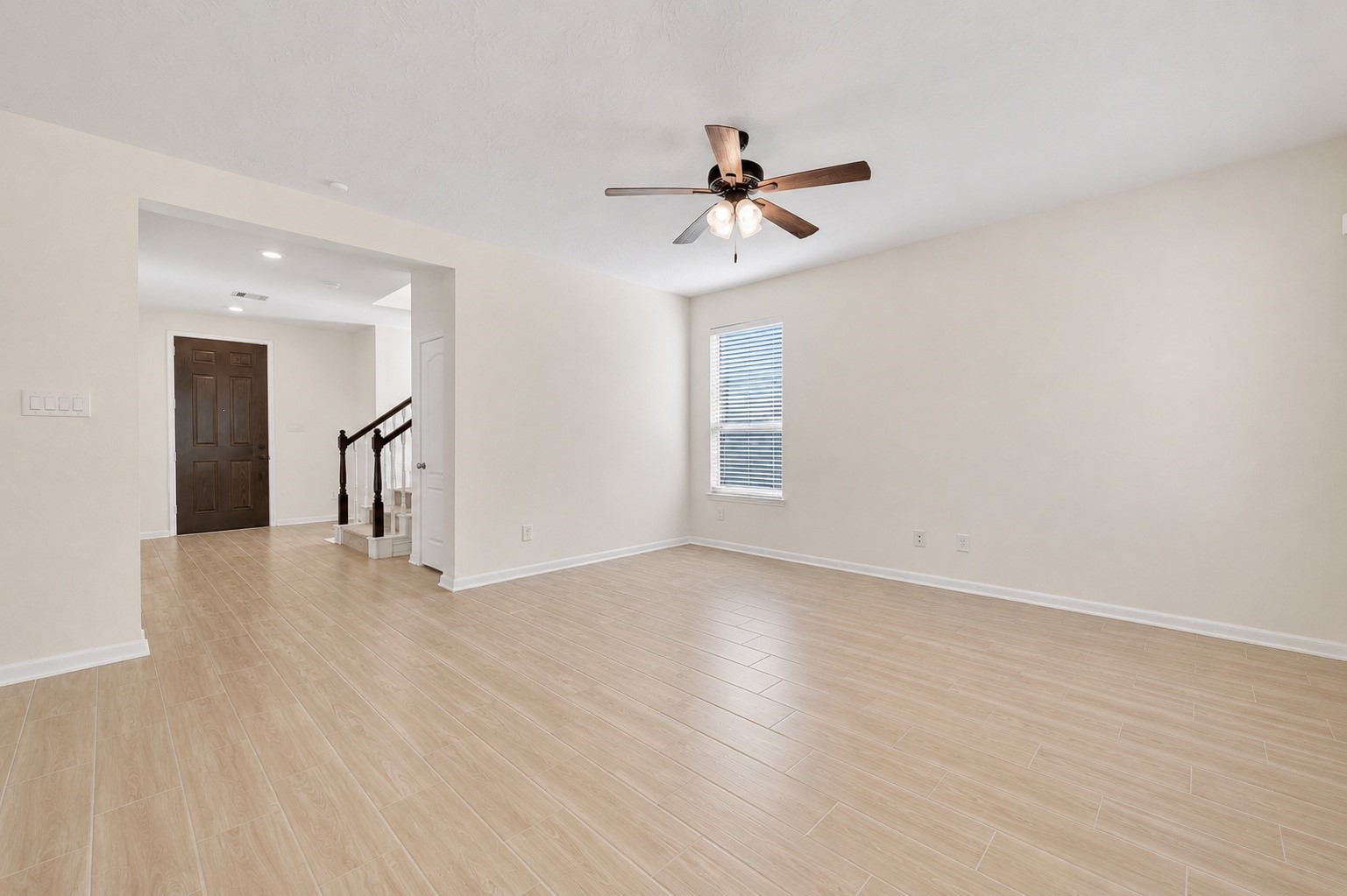 2107 Parnevik Place Conroe, TX 77304 - Photo 9 of 44 Step into your enormous living room