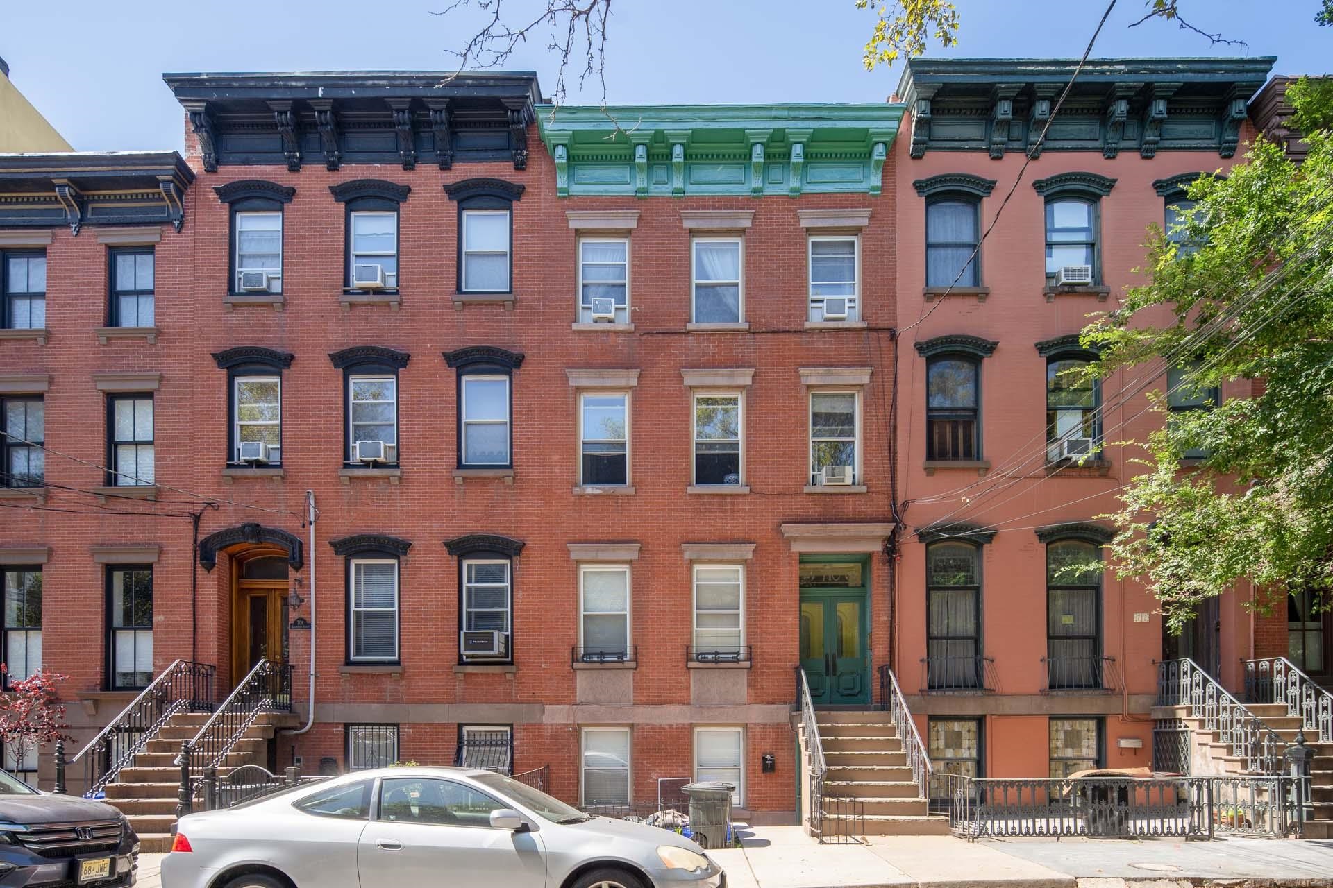 710 Bloomfield Street, Unit 3 Hoboken, NJ 07030 - Photo 13 of 13 a front view of a building with a yard