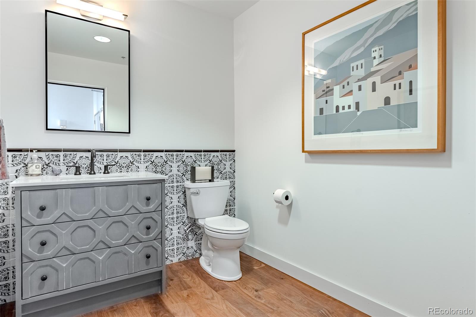 2229 Blake Street, Unit 709 Denver, CO 80205 - Photo 20 of 40 a bathroom with a toilet and a sink