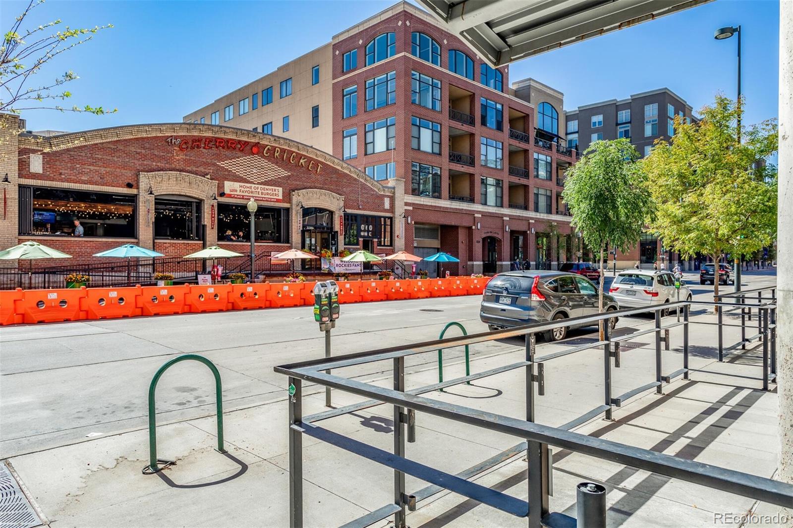 2229 Blake Street, Unit 709 Denver, CO 80205 - Photo 33 of 40 a view of a chairs and table in the patio