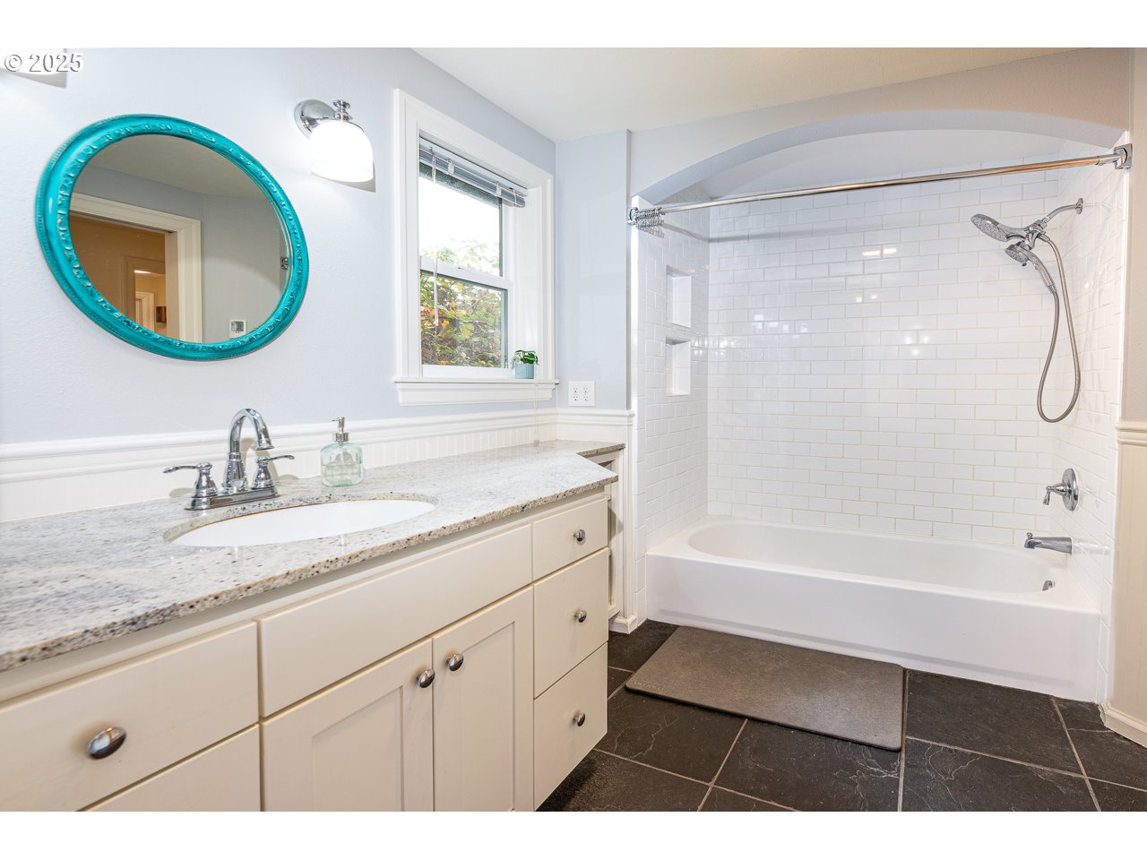 2575 Chula Vista Boulevard Eugene, OR 97403 - Photo 30 of 40 a bathroom with a sink a vanity and a mirror