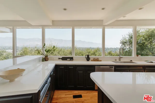 a patio with a table and chairs
