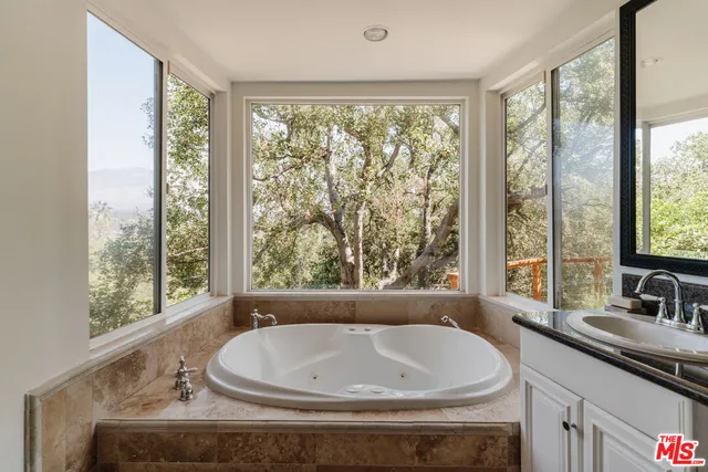 a living room with couch and a window