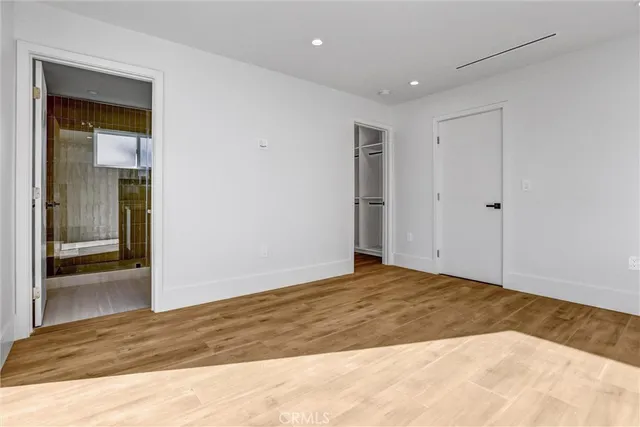 a bathroom with a shower and a sink