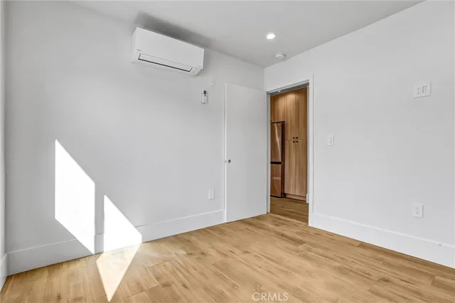 a bathroom with a toilet sink and shower
