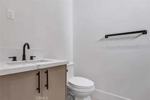 a view of a balcony with a tree
