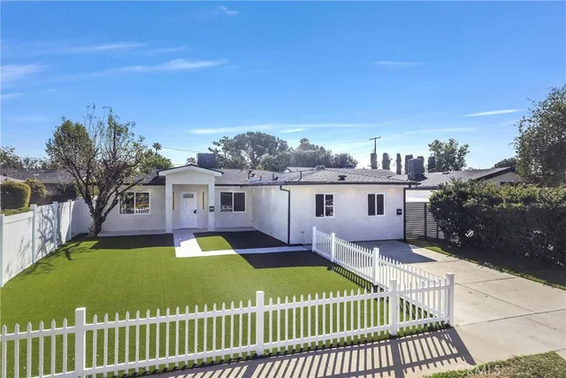 a view of a house with a patio