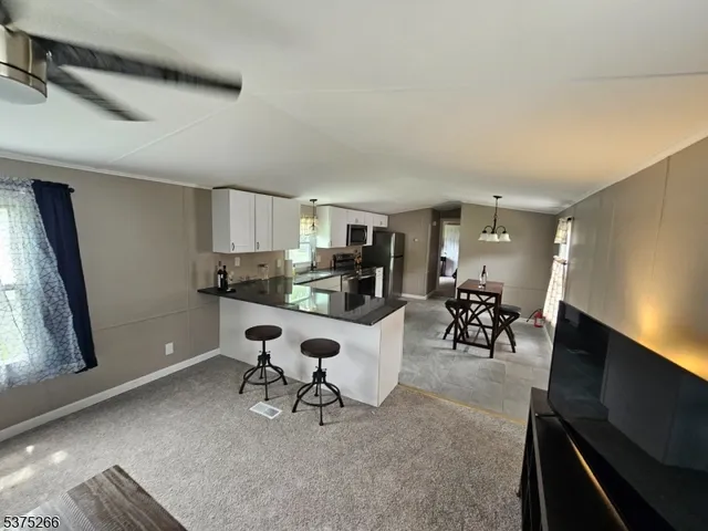 a workspace with furniture and a window