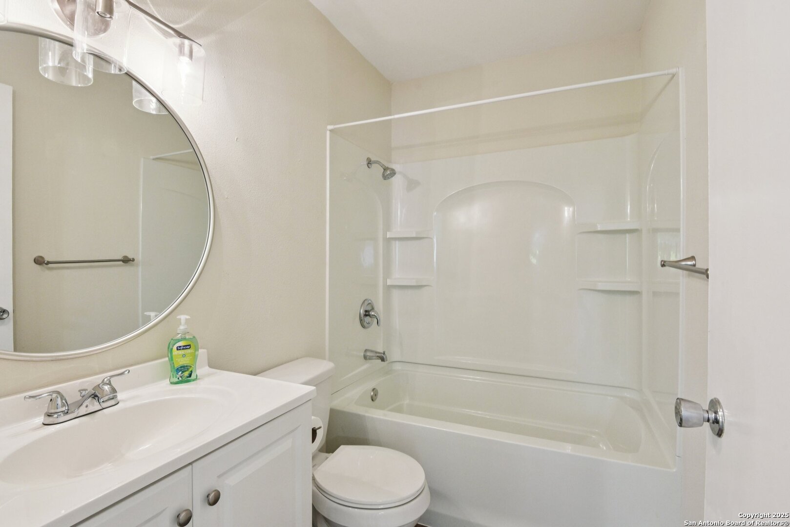 6630 Spring Hollow Street San Antonio, TX 78249 - Photo 24 of 40 a bathroom with a sink a toilet and shower