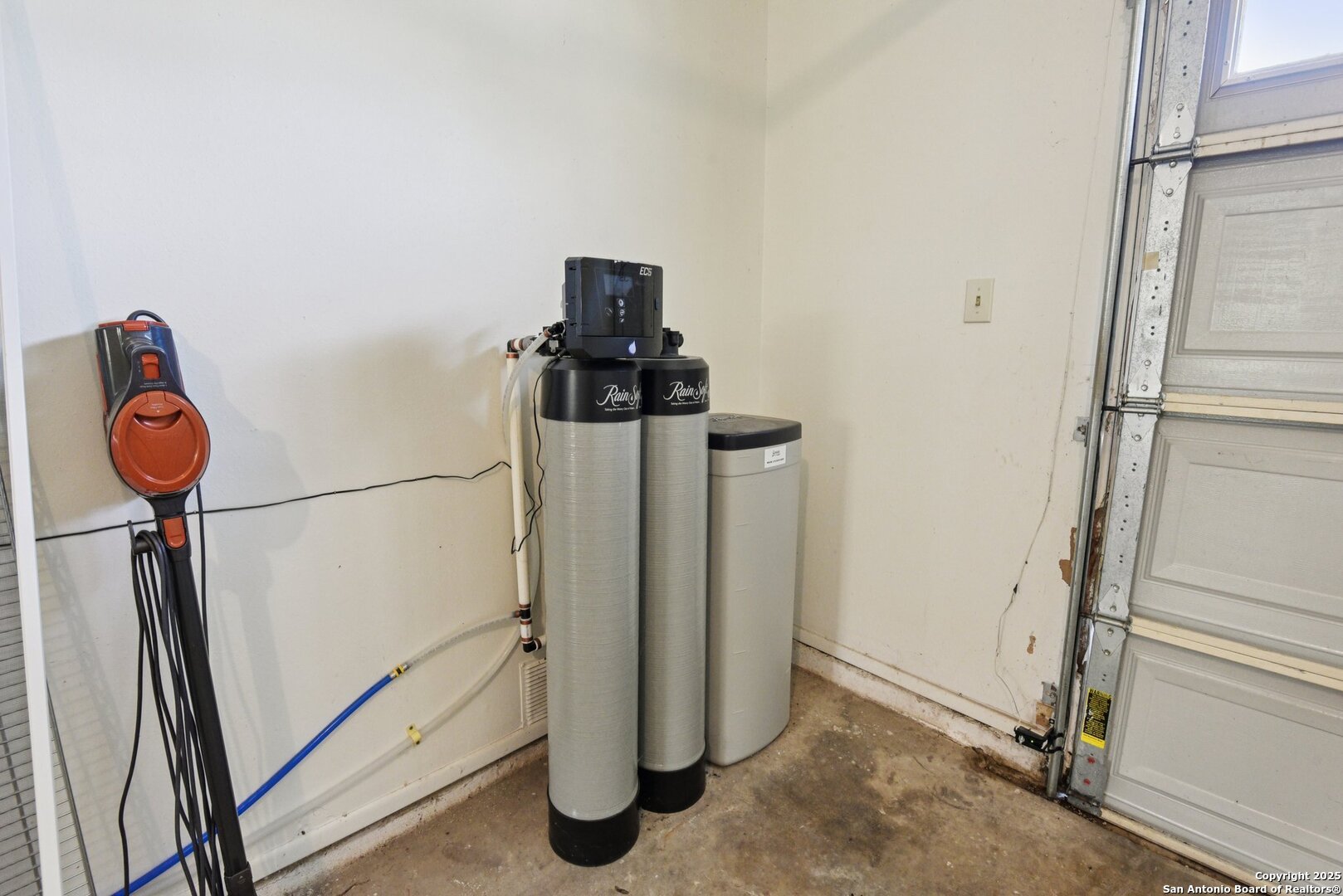 6630 Spring Hollow Street San Antonio, TX 78249 - Photo 36 of 40 a view of a hallway with storage