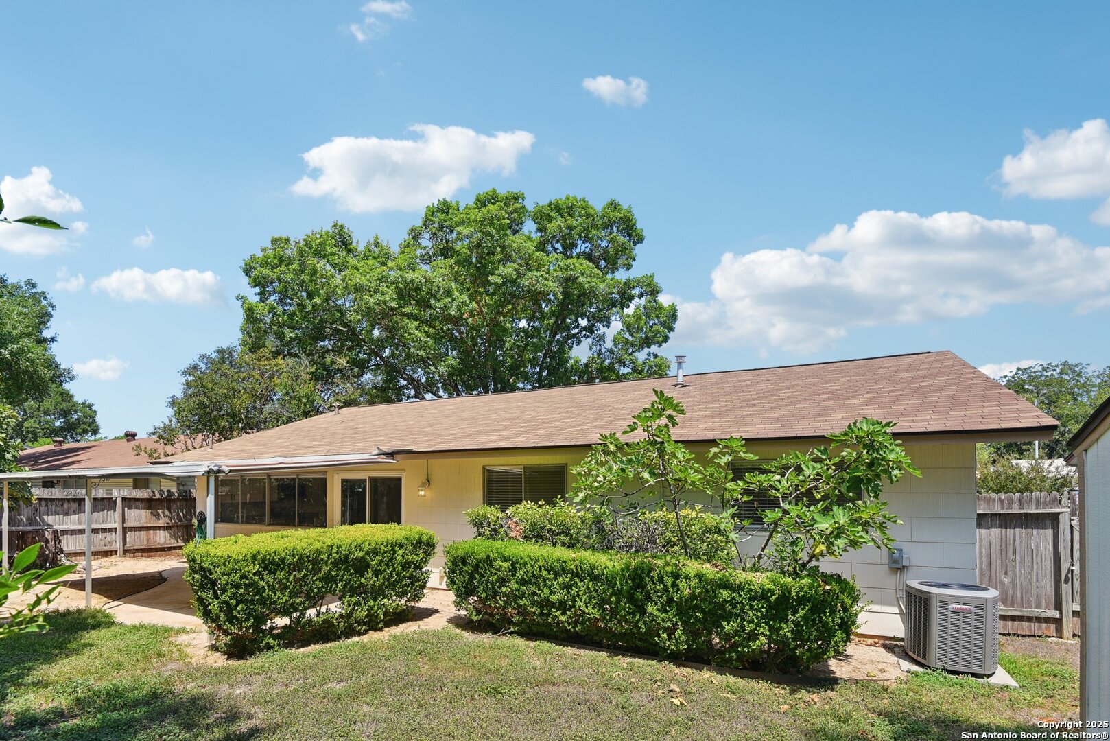 6630 Spring Hollow Street San Antonio, TX 78249 - Photo 38 of 40 a front view of a house with a yard