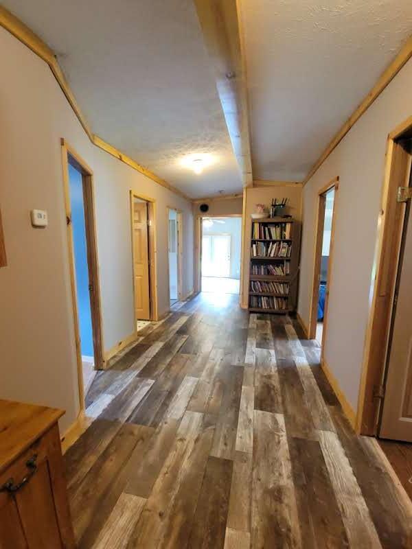 6414 West 18 Road Mesick, MI 49668 - Photo 20 of 53 Hallway to rooms and playroom