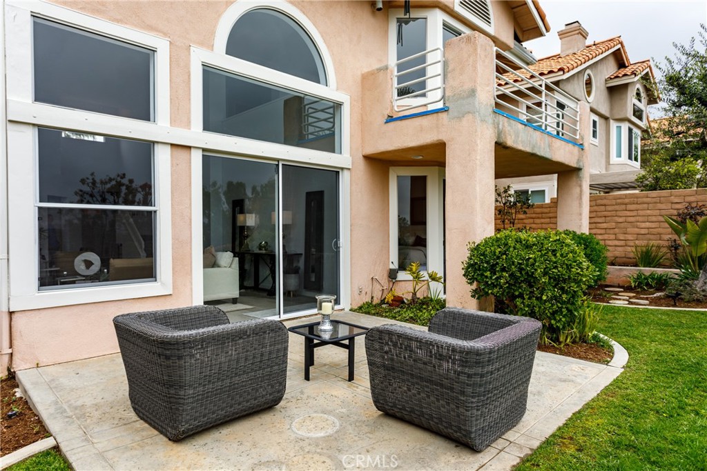 29672 Teracina Laguna Niguel, CA 92677 - Photo 31 of 35 a patio with couches and a fire pit