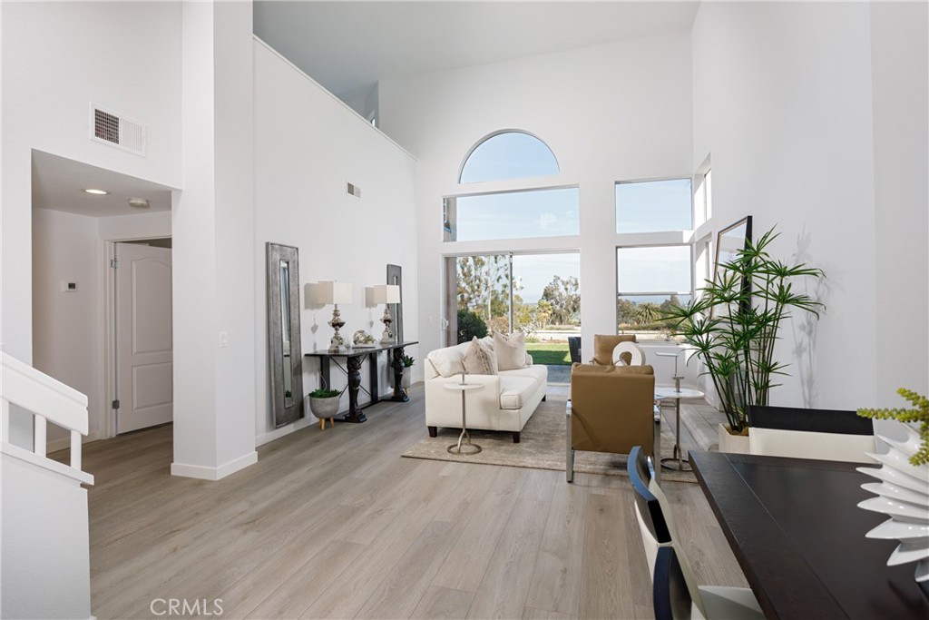 29672 Teracina Laguna Niguel, CA 92677 - Photo 7 of 35 a living room with furniture and a large window
