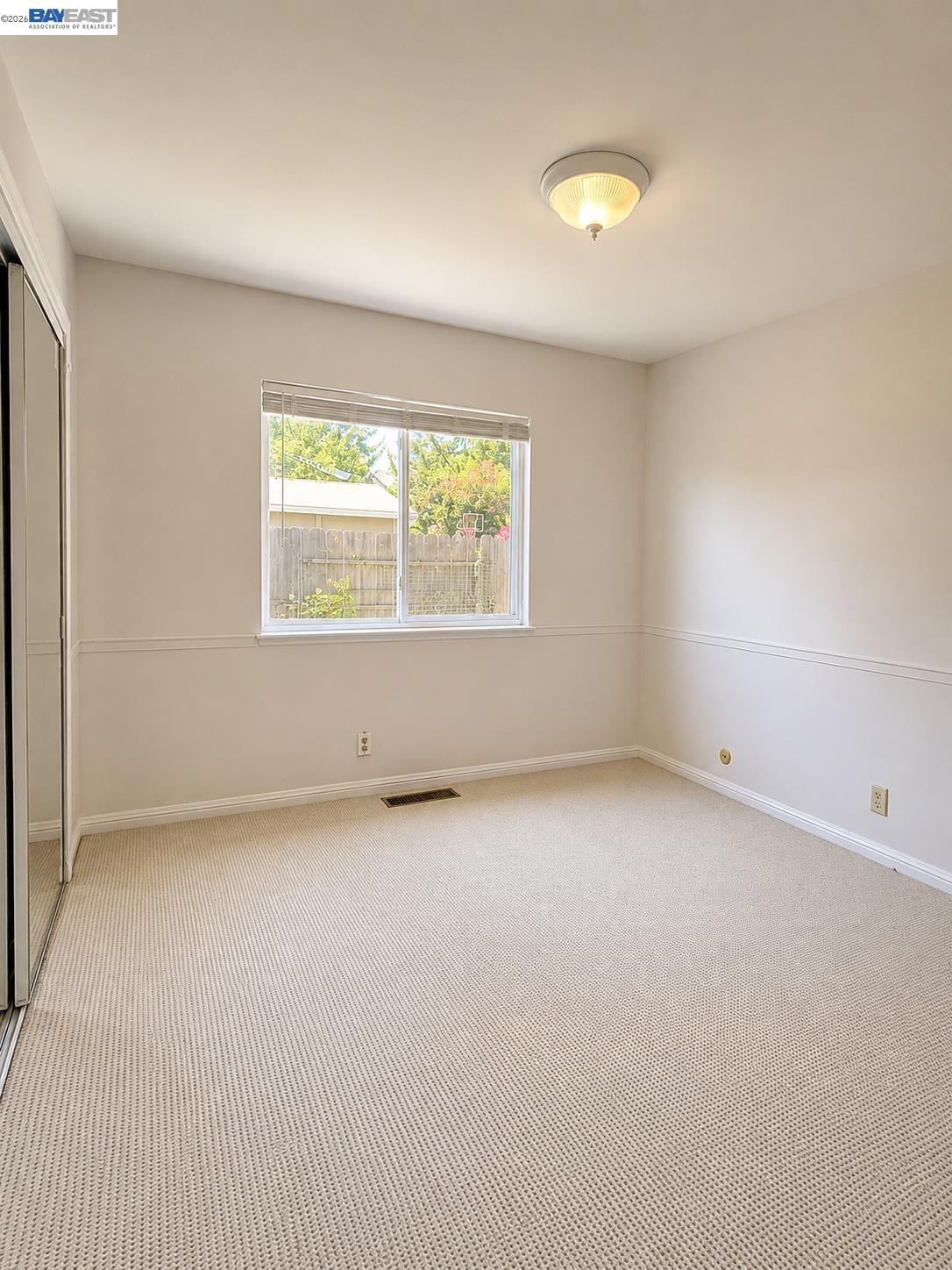 2516 Dos Rios Drive San Ramon, CA 94583 - Photo 14 of 14 an empty room with a window