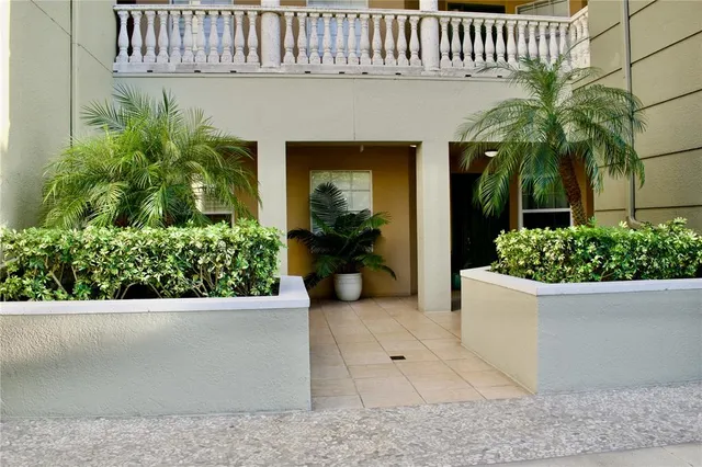 an empty room with closet and a bathroom