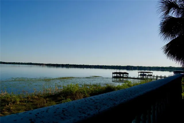 a view of a lake from a balcony