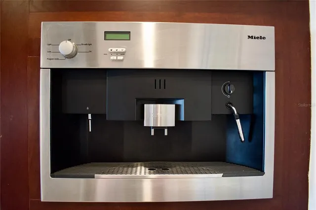 a view of a hallway with windows