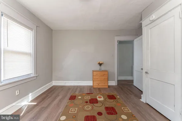 a rug and a window in a room