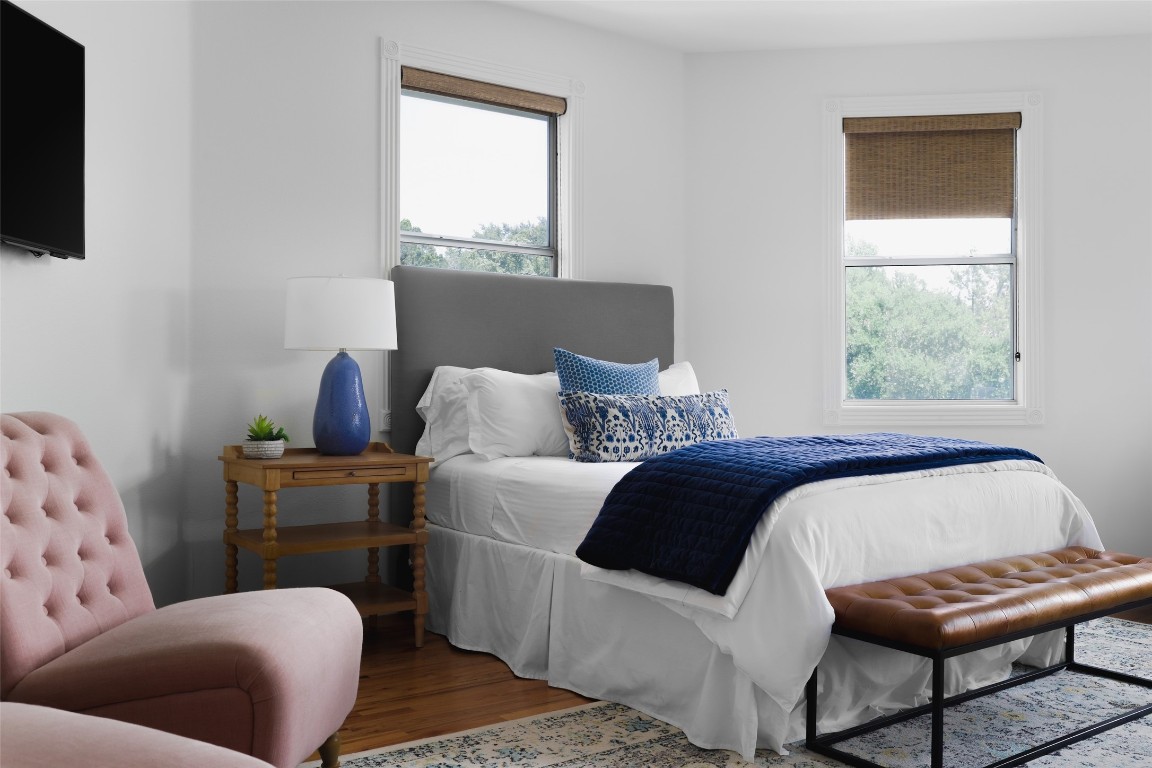 11505 Southwest Oaks Austin, TX 78737 - Photo 19 of 38 a bedroom with a bed and a couch