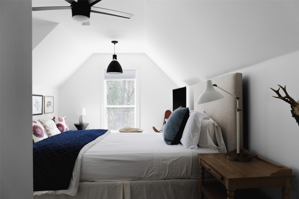 11505 Southwest Oaks Austin, TX 78737 - Photo 25 of 38 a bedroom with a bed and a window