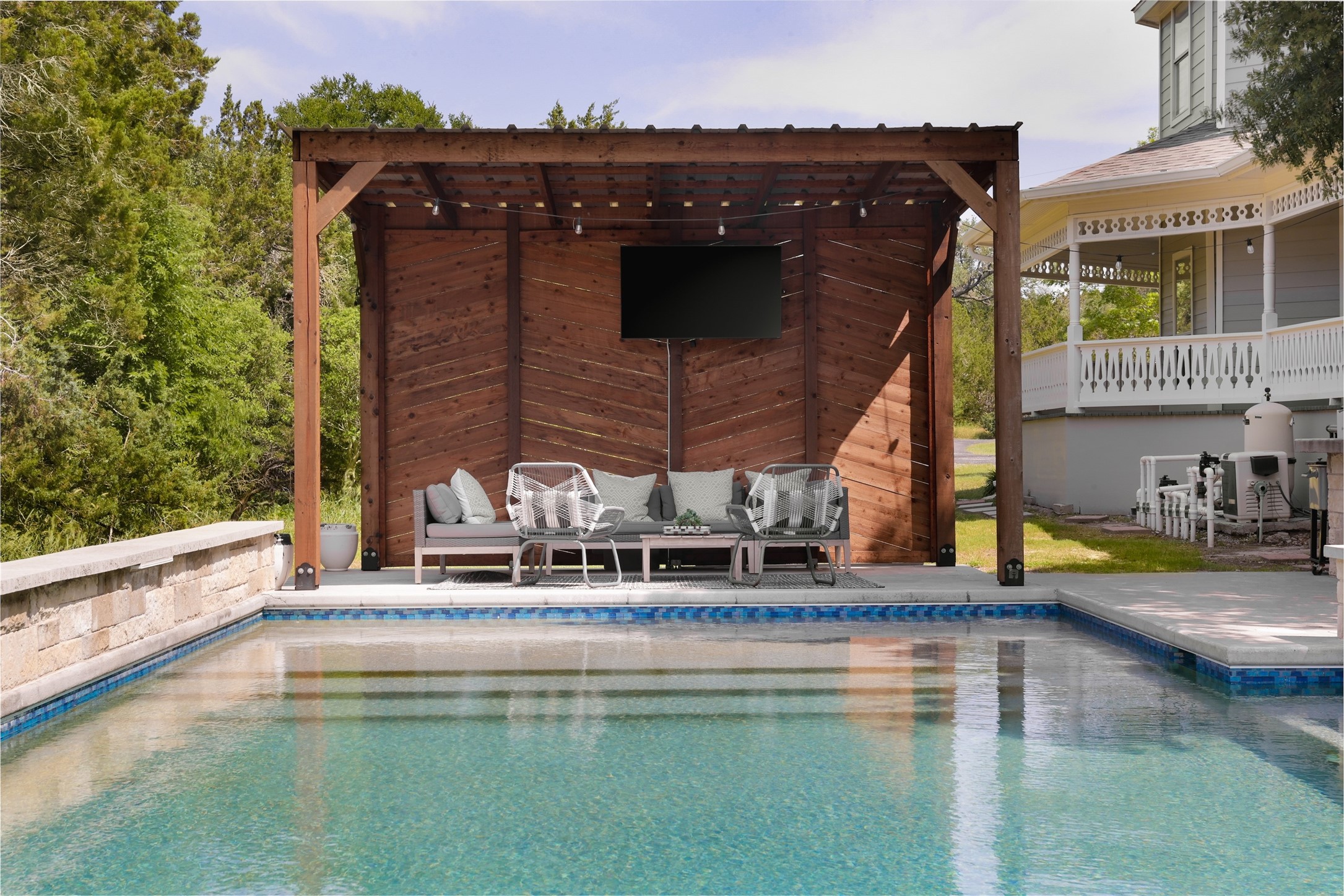 11505 Southwest Oaks Austin, TX 78737 - Photo 33 of 38 a view of a swimming pool with a bench