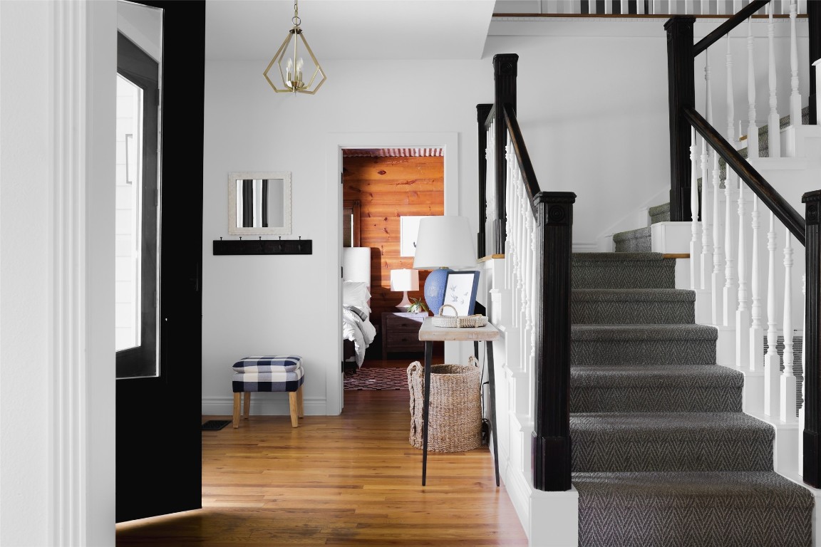 11505 Southwest Oaks Austin, TX 78737 - Photo 6 of 38 a view of entryway and hall with wooden floor